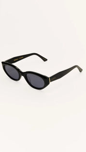 Black cat-eye sunglasses.