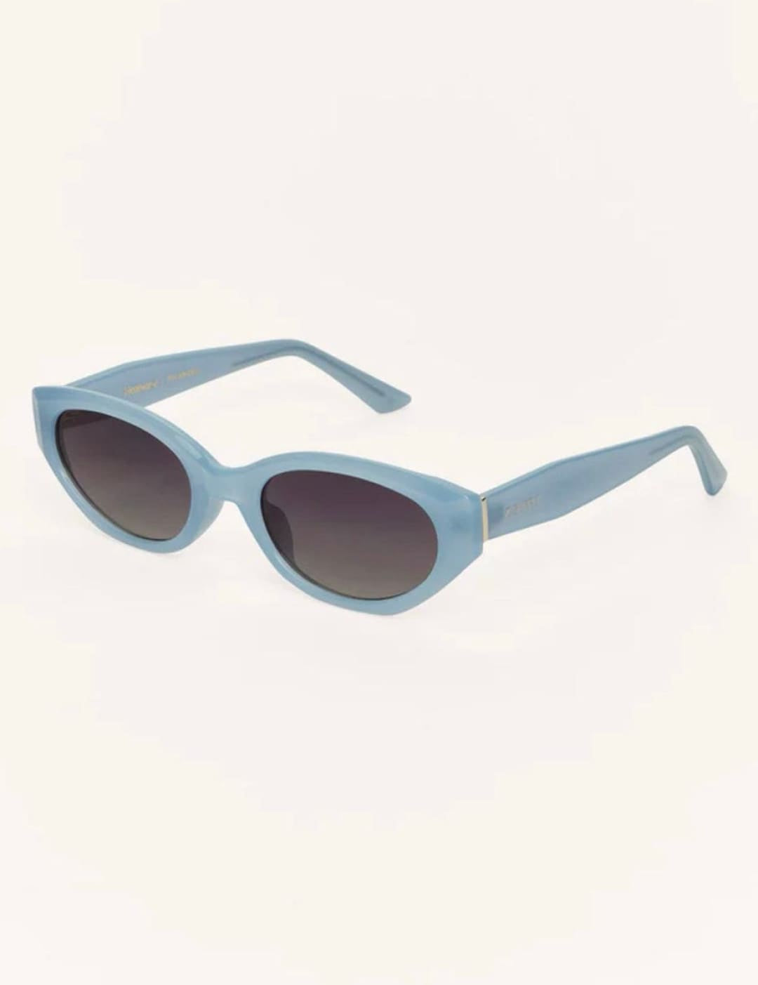 Light blue oval sunglasses.