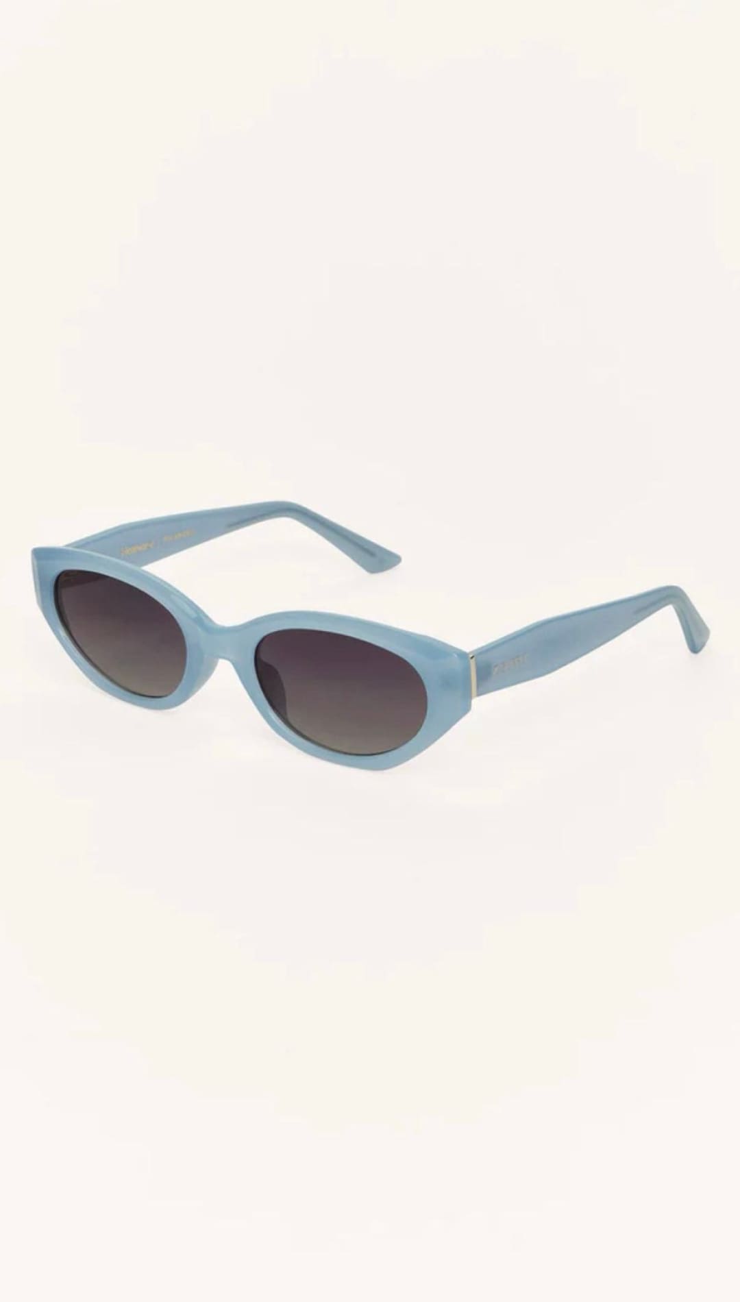 Light blue oval sunglasses.