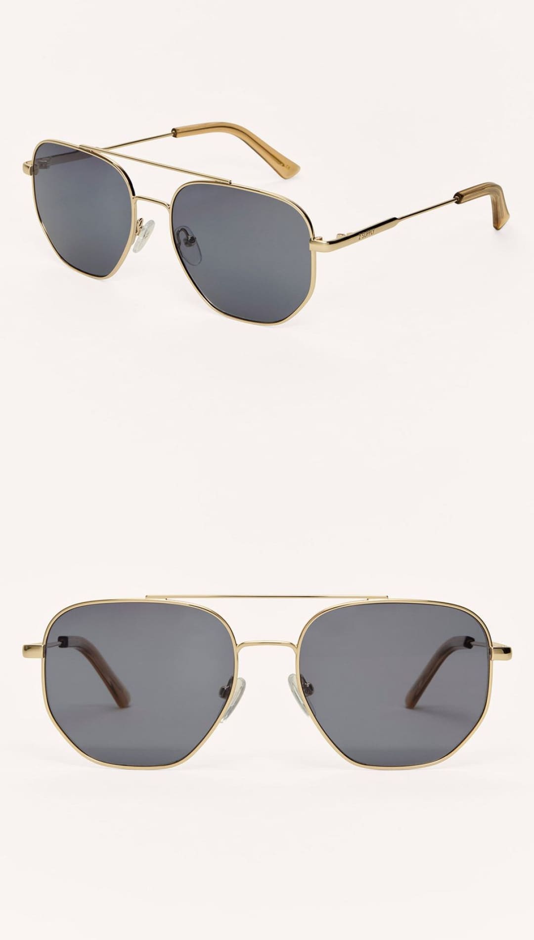 Gold-framed aviator sunglasses with dark lenses.