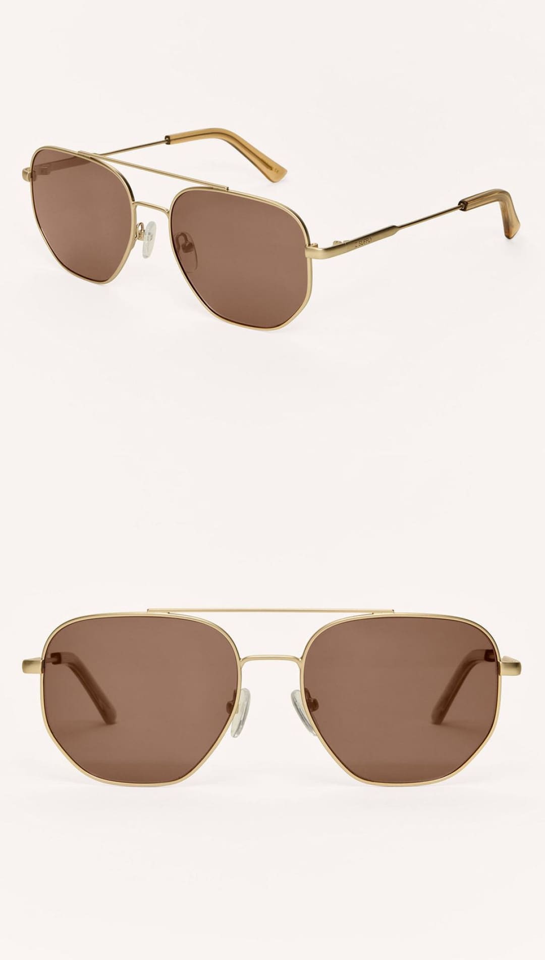 Gold-framed sunglasses with brown hexagonal lenses