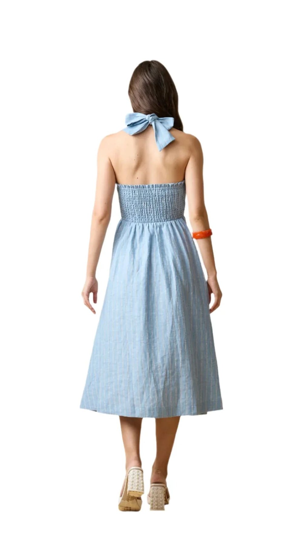 Woman’s light blue halter dress.