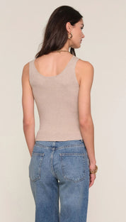 Beige tank top with scoop neckline and thin straps, likely made of cotton or polyester blend.