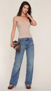 Light blue denim jeans with a relaxed fit and distressed detailing, featuring the brand ’levi’s’ model 501.