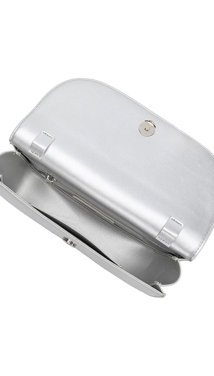 Open silver clutch purse.
