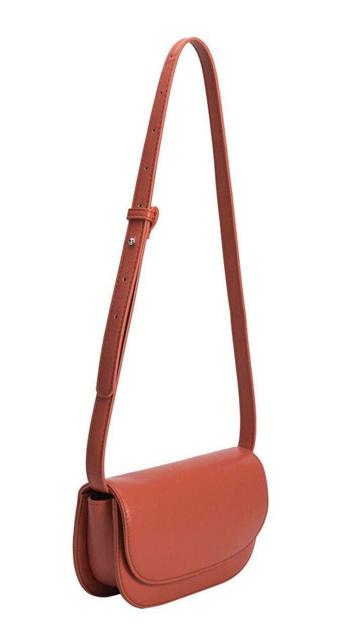 Orange leather shoulder bag.