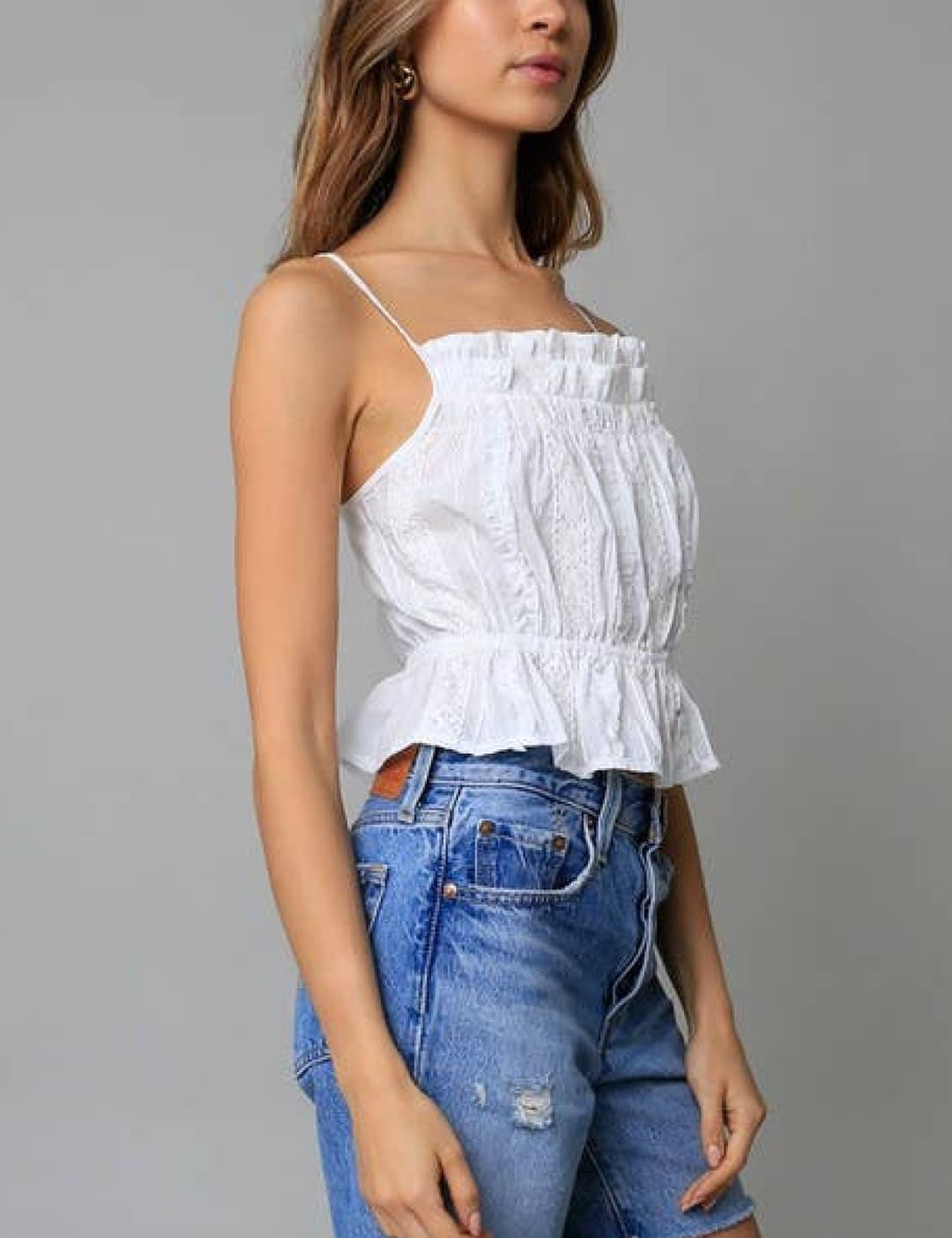 White ruffled camisole top with thin straps