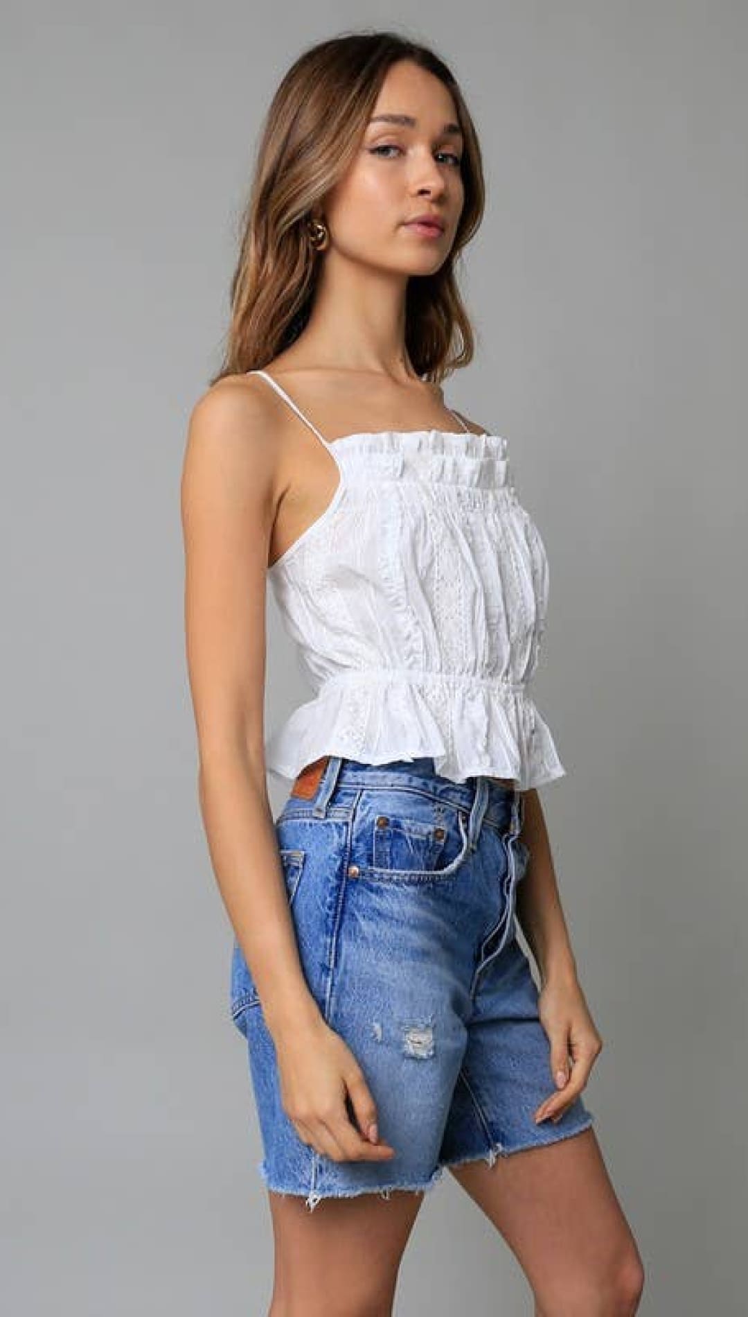 White ruffled camisole top with thin straps