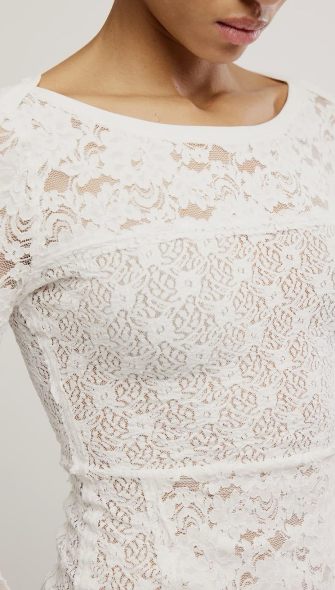 White lace long-sleeved top.