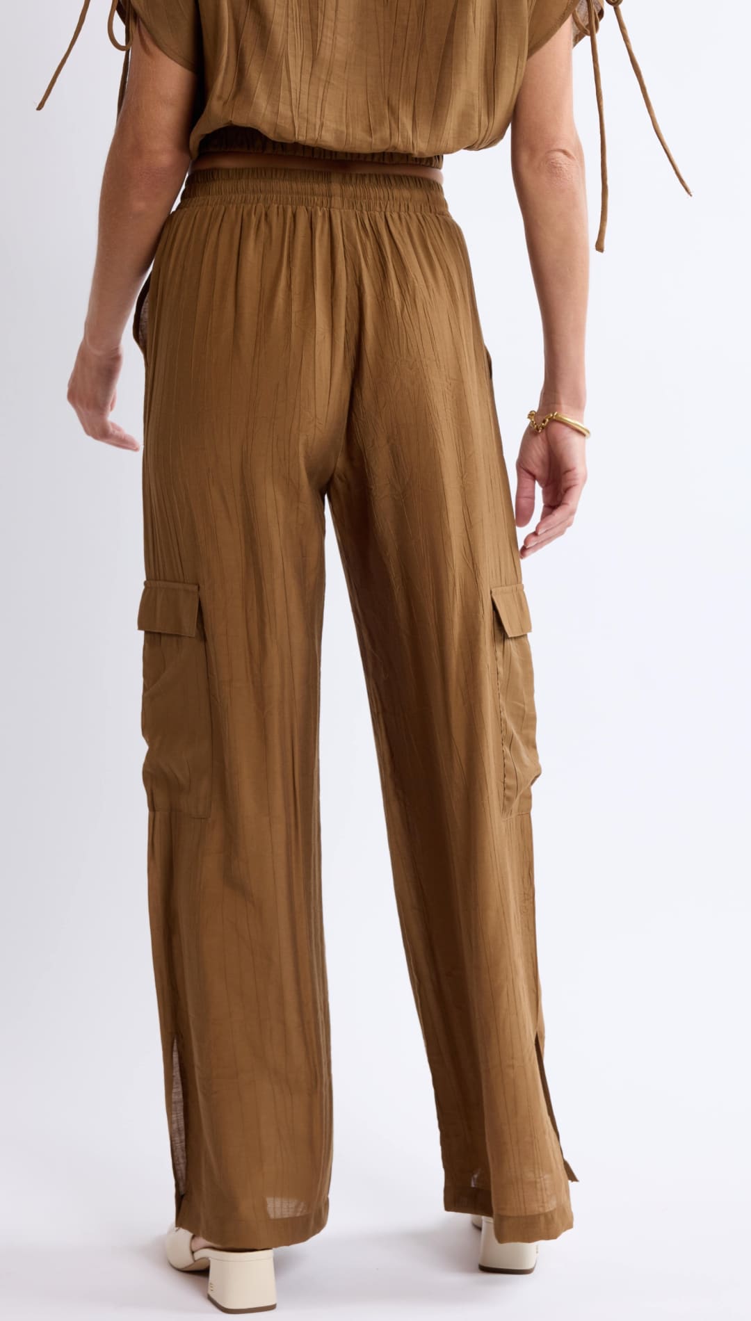 Brown cargo pants with elastic waist.