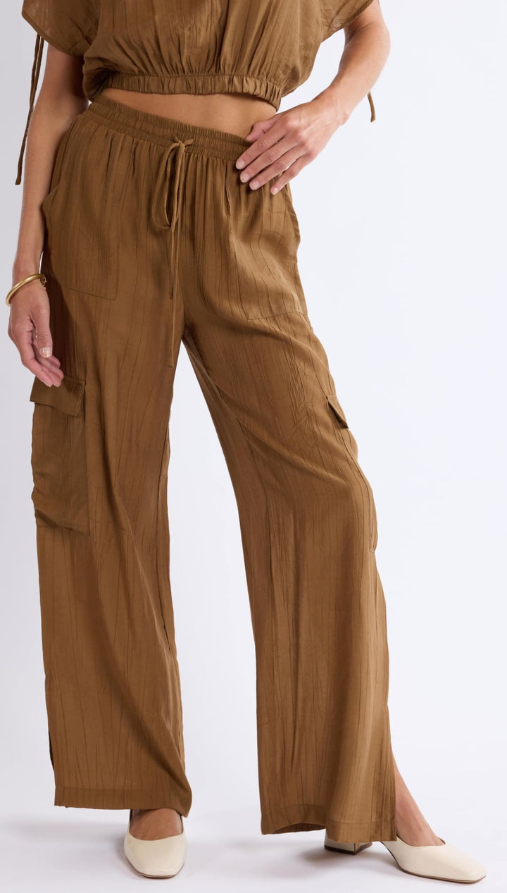 Brown, wide-legged cargo pants.