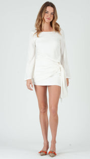 White long-sleeved mini dress with a draped side tie and square neckline