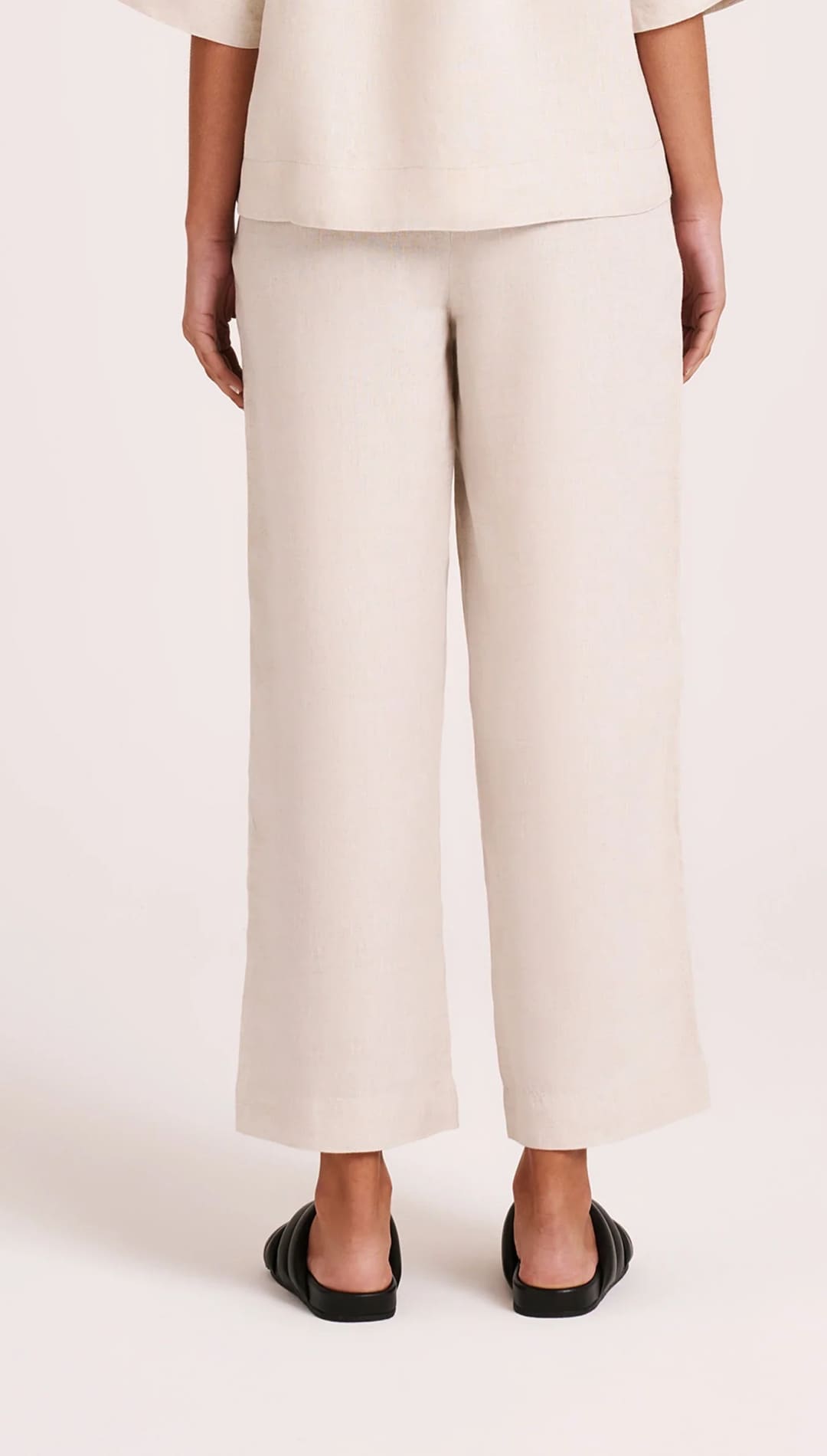 Beige wide-leg pants.