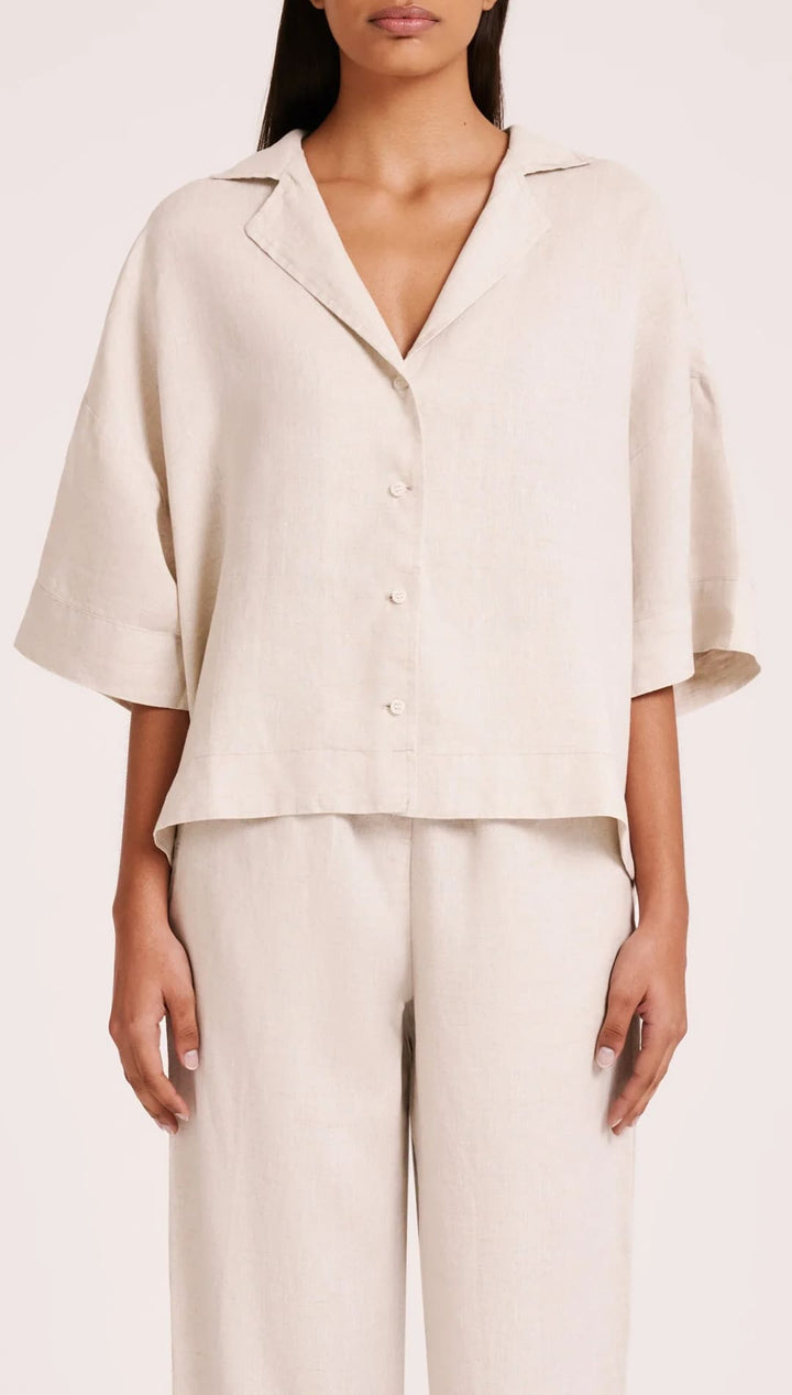 Beige linen pajama set.