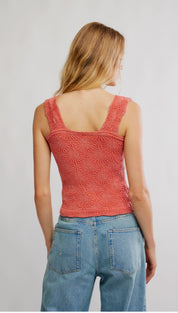 Coral-colored lace tank top with square shoulder straps and a textured, patterned design