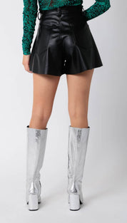 Black faux leather flared shorts with a high waist.
