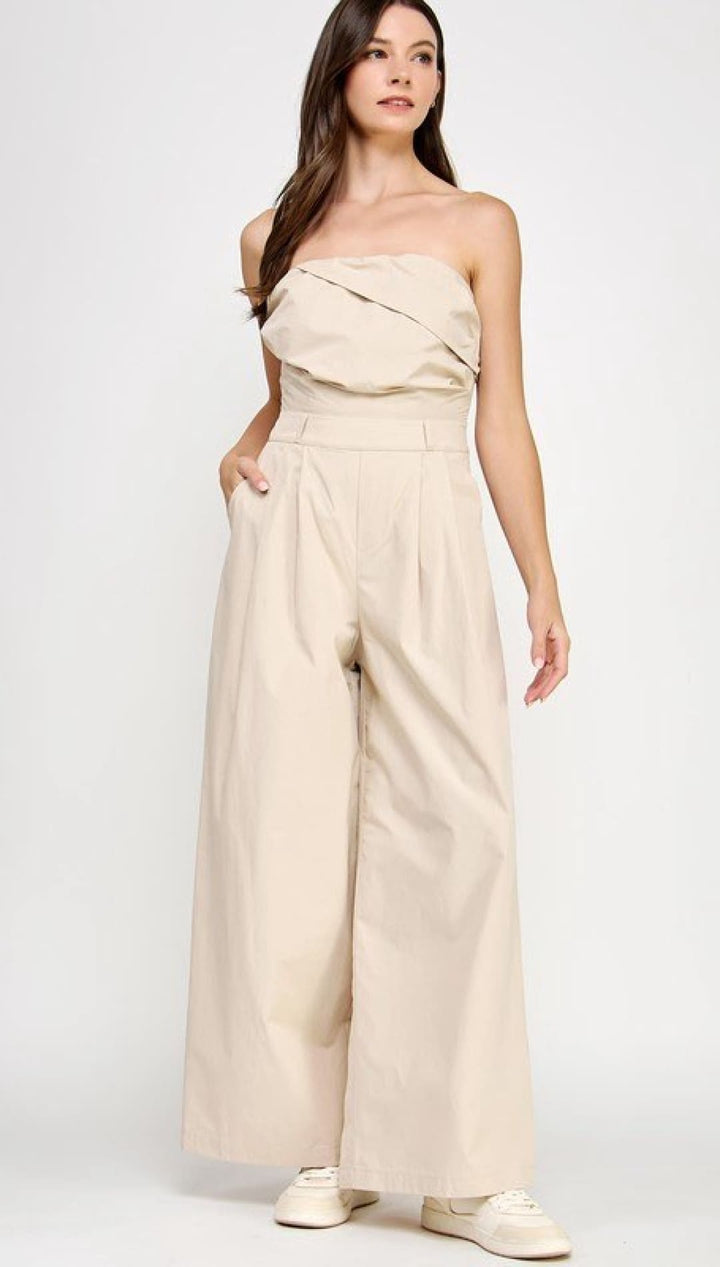 Beige strapless jumpsuit.