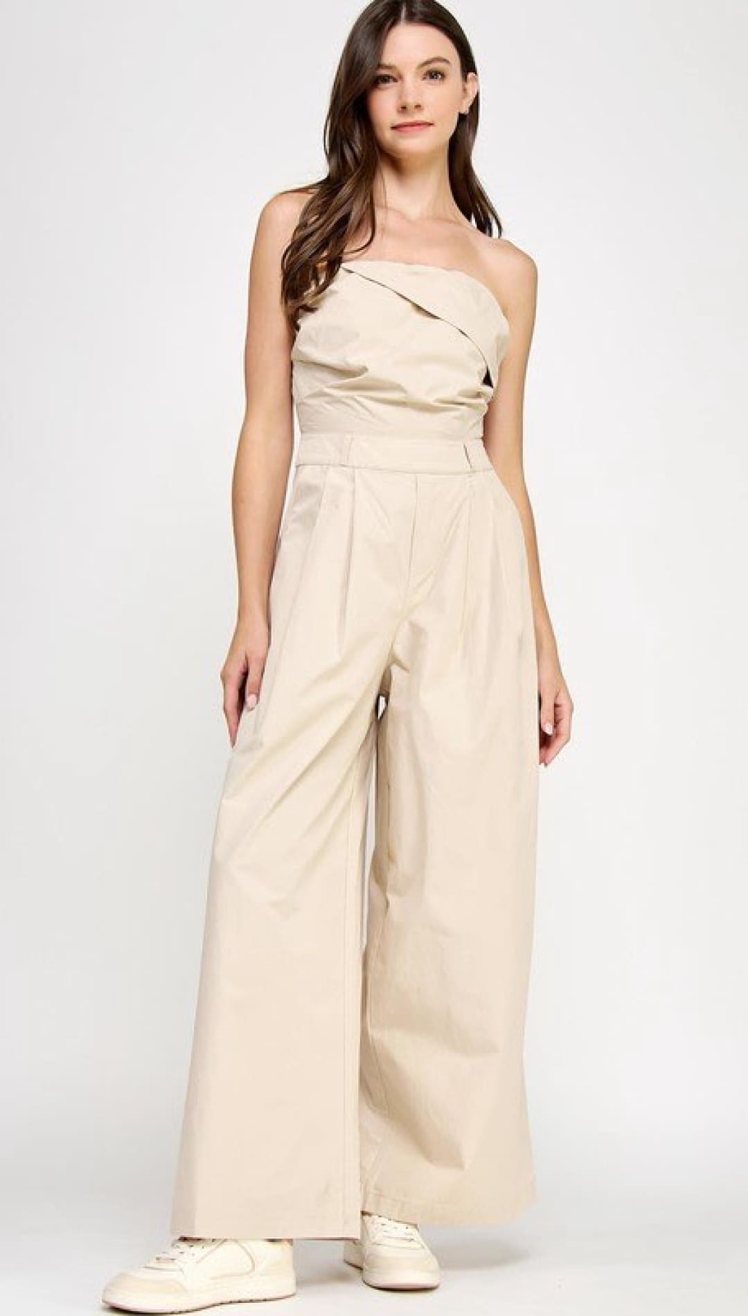 Beige strapless jumpsuit.