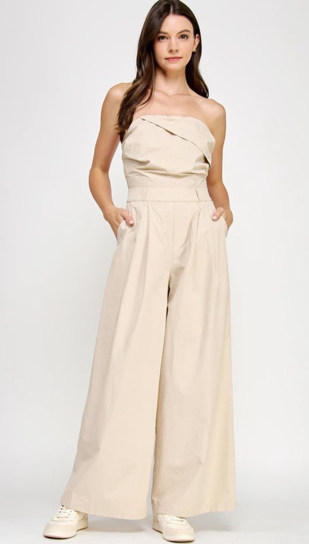 Beige strapless jumpsuit.