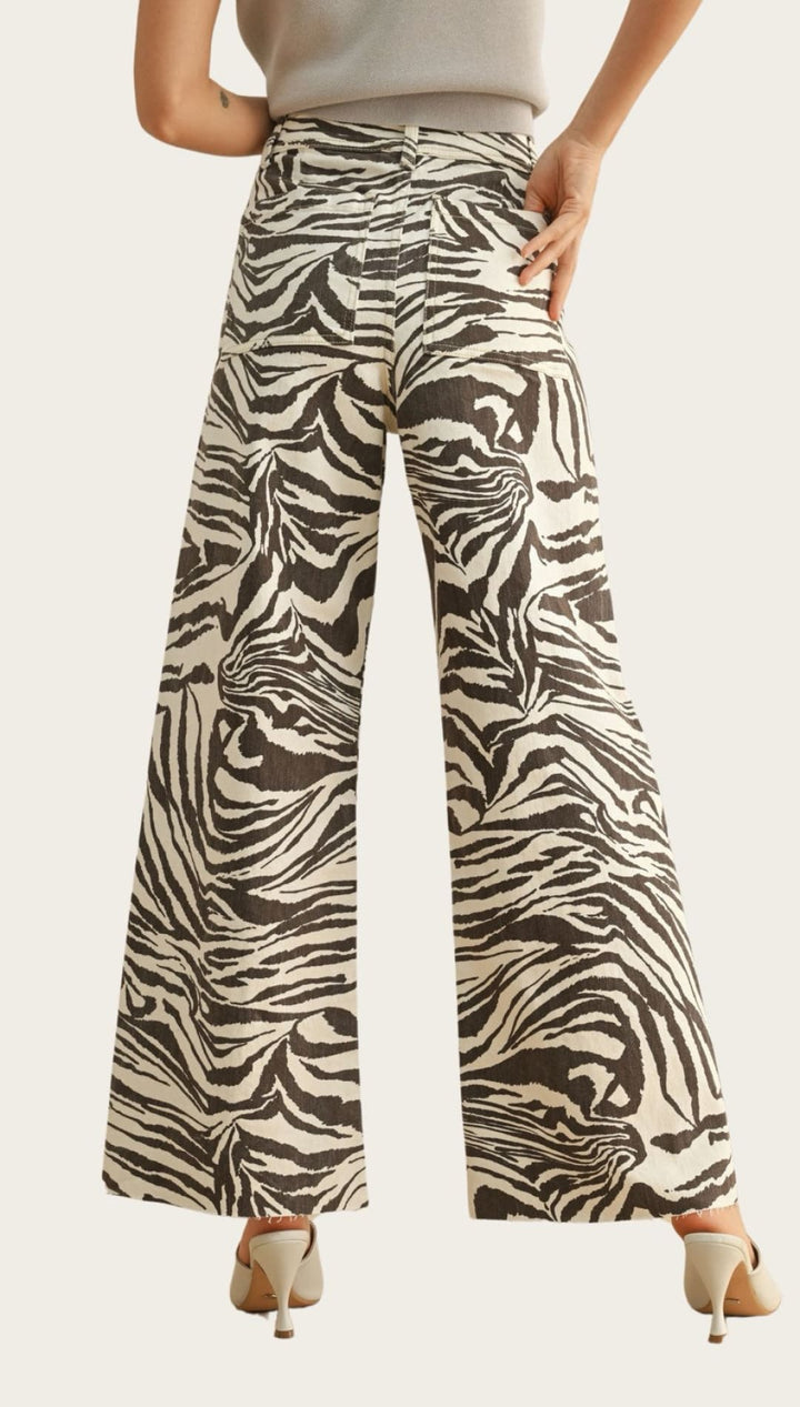 Zebra-print wide-leg pants.