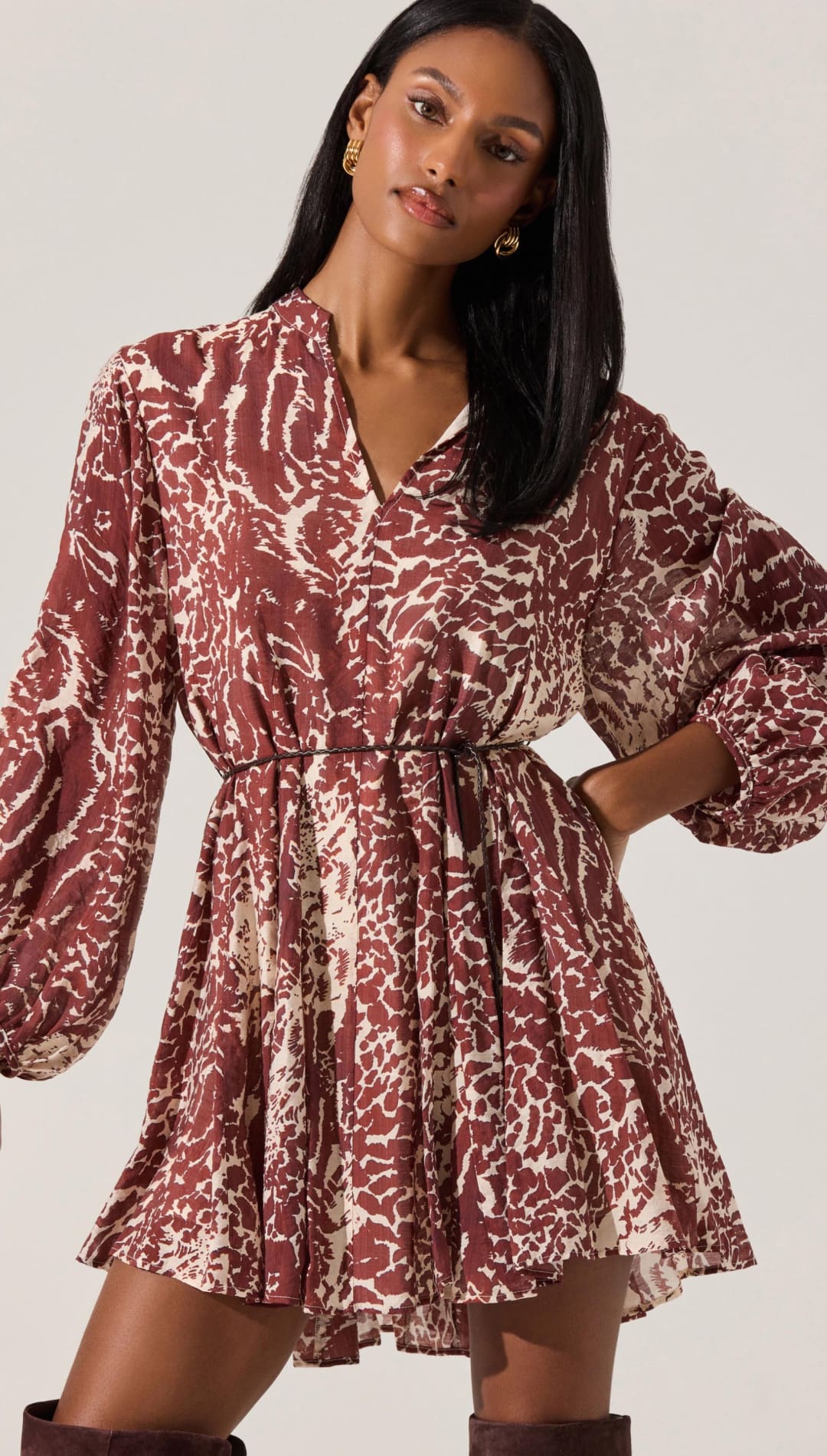 Patterned long-sleeved mini dress.