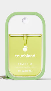 Touchland power mist keychain spray bottle with green accents and clear plastic body.