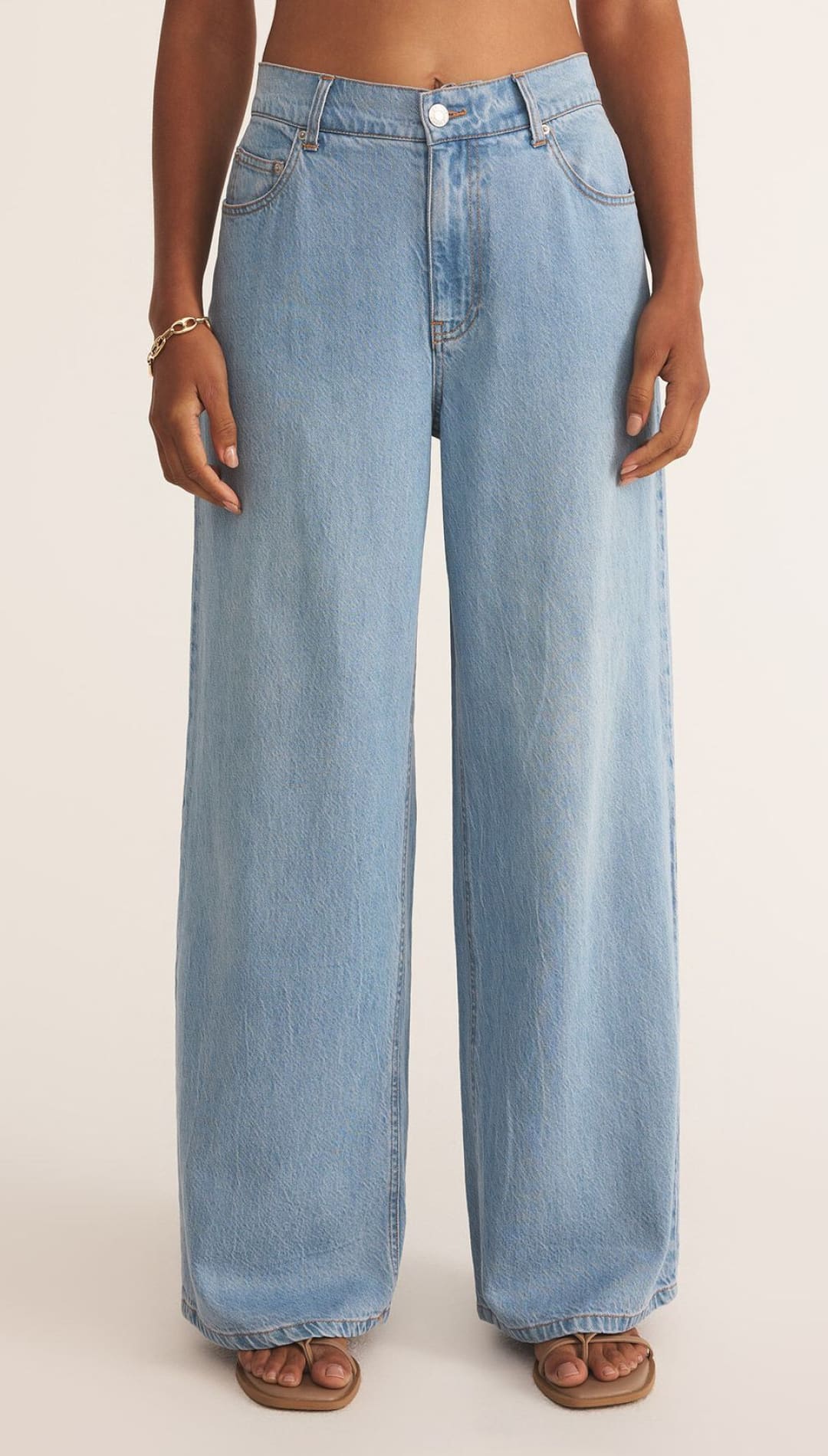 Light blue wide-leg jeans.