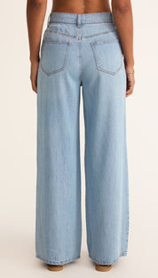 Light blue wide-leg jeans.