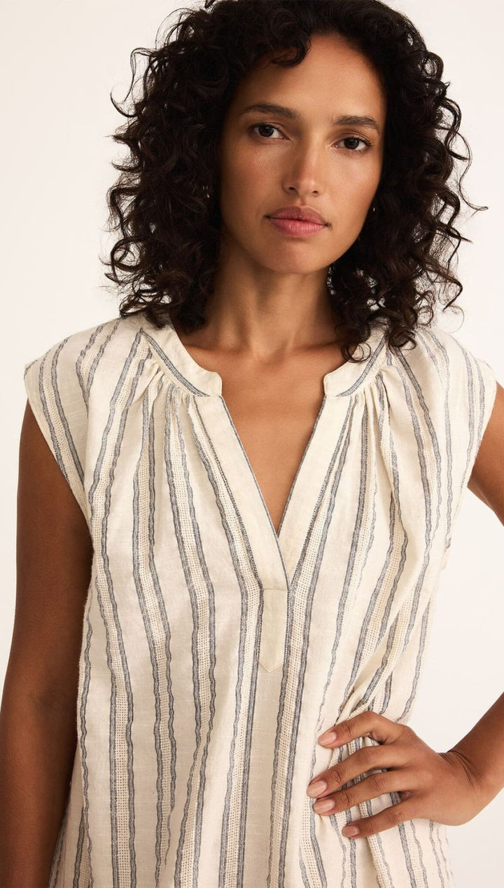 Striped, sleeveless blouse.