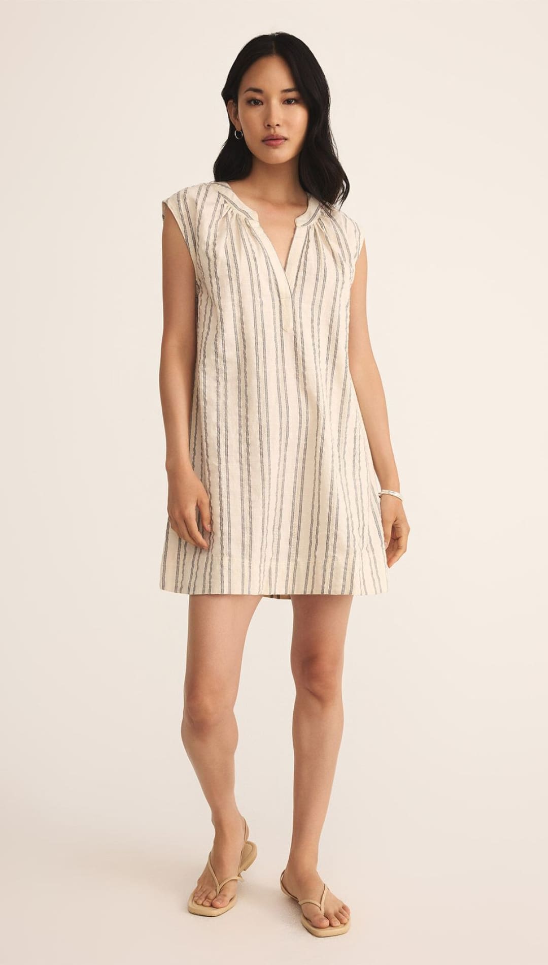 Striped, sleeveless, v-neck dress.
