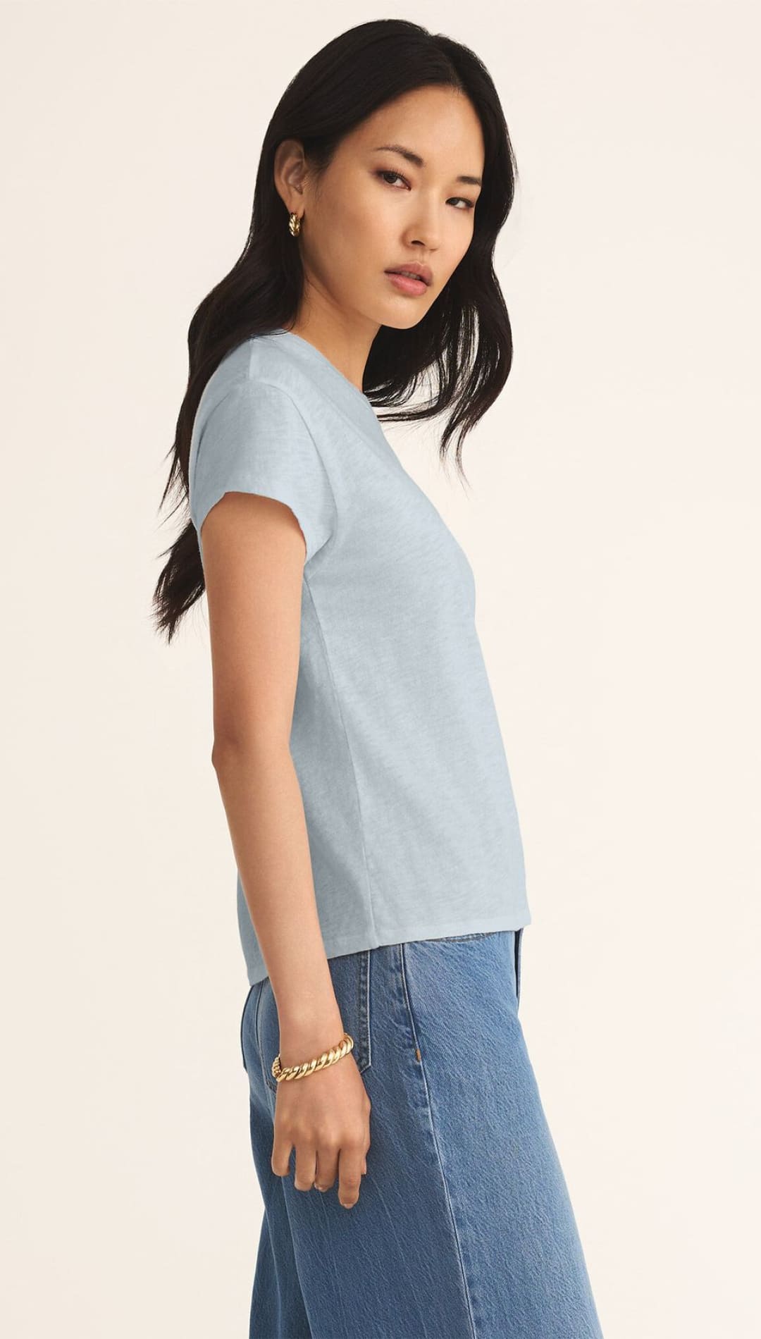 Light blue t-shirt.