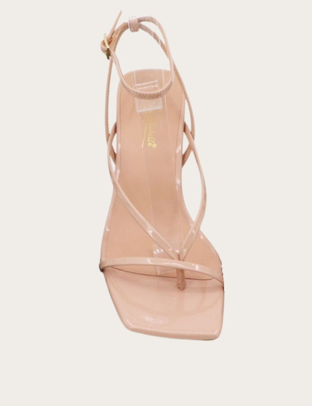Beige strappy heeled sandal.