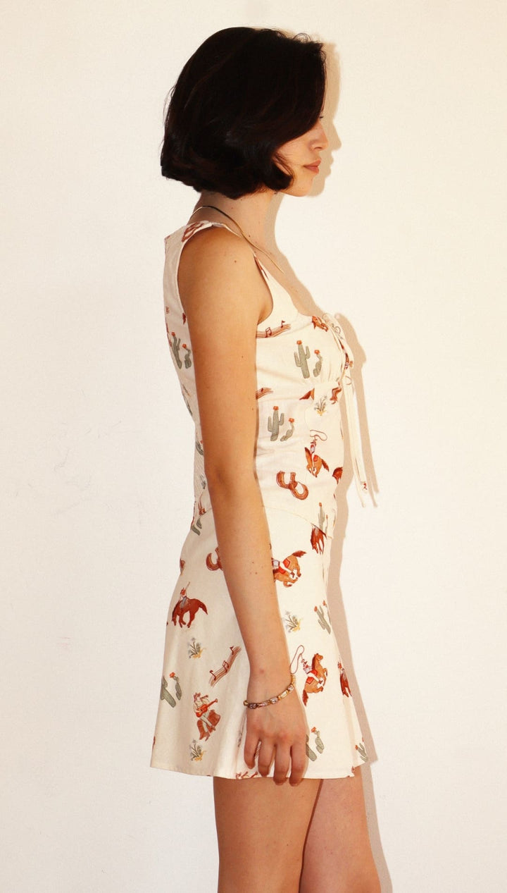Cowboy-themed mini dress.