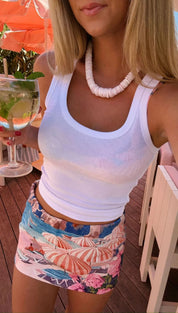 White ribbed tank top with a scoop neckline