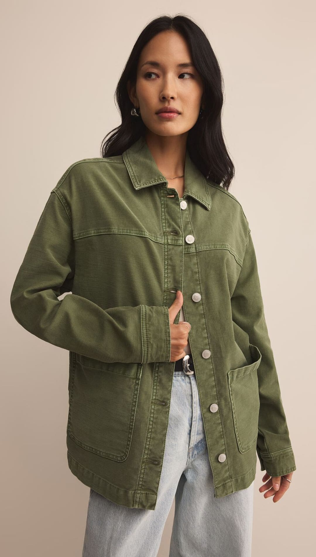 Olive green button-up jacket with four front pockets.
