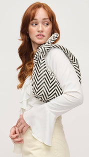 Black and white chevron patterned handbag.