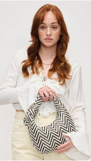 Black and white chevron patterned handbag.