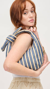 Striped knotted shoulder bag.