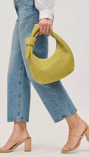 Woven chartreuse knotted handbag.