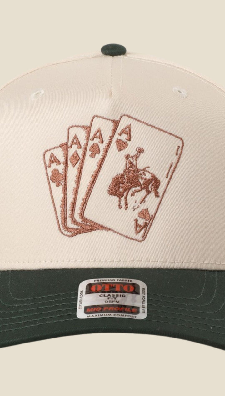Cowboy hat with embroidered playing cards design, green and white.