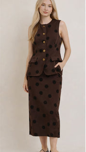 Brown sleeveless vest with black polka dots and gold buttons, paired with a matching skirt.