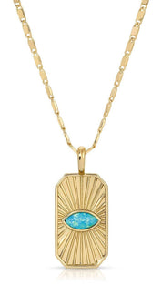 Gold necklace with turquoise eye pendant.