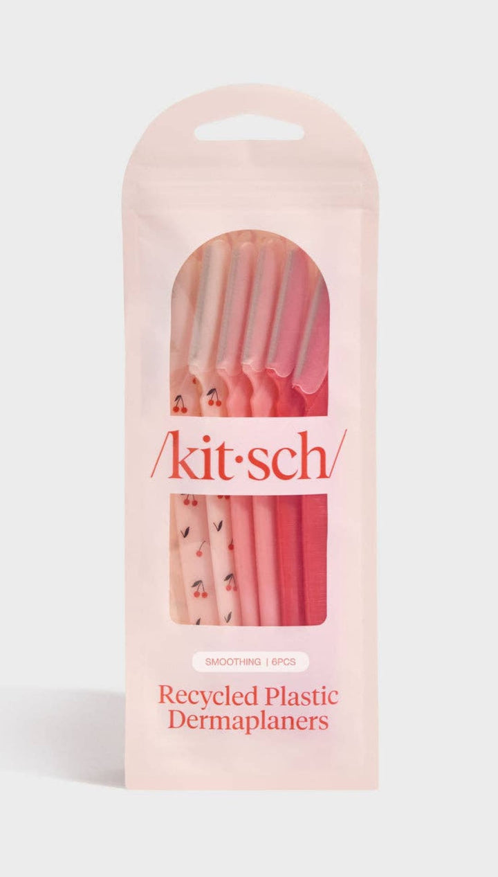 Recycled plastic dermaplaners in pink with floral patterns.