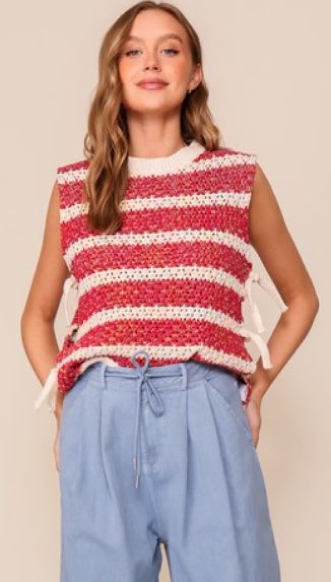 Striped knit vest with side ties.