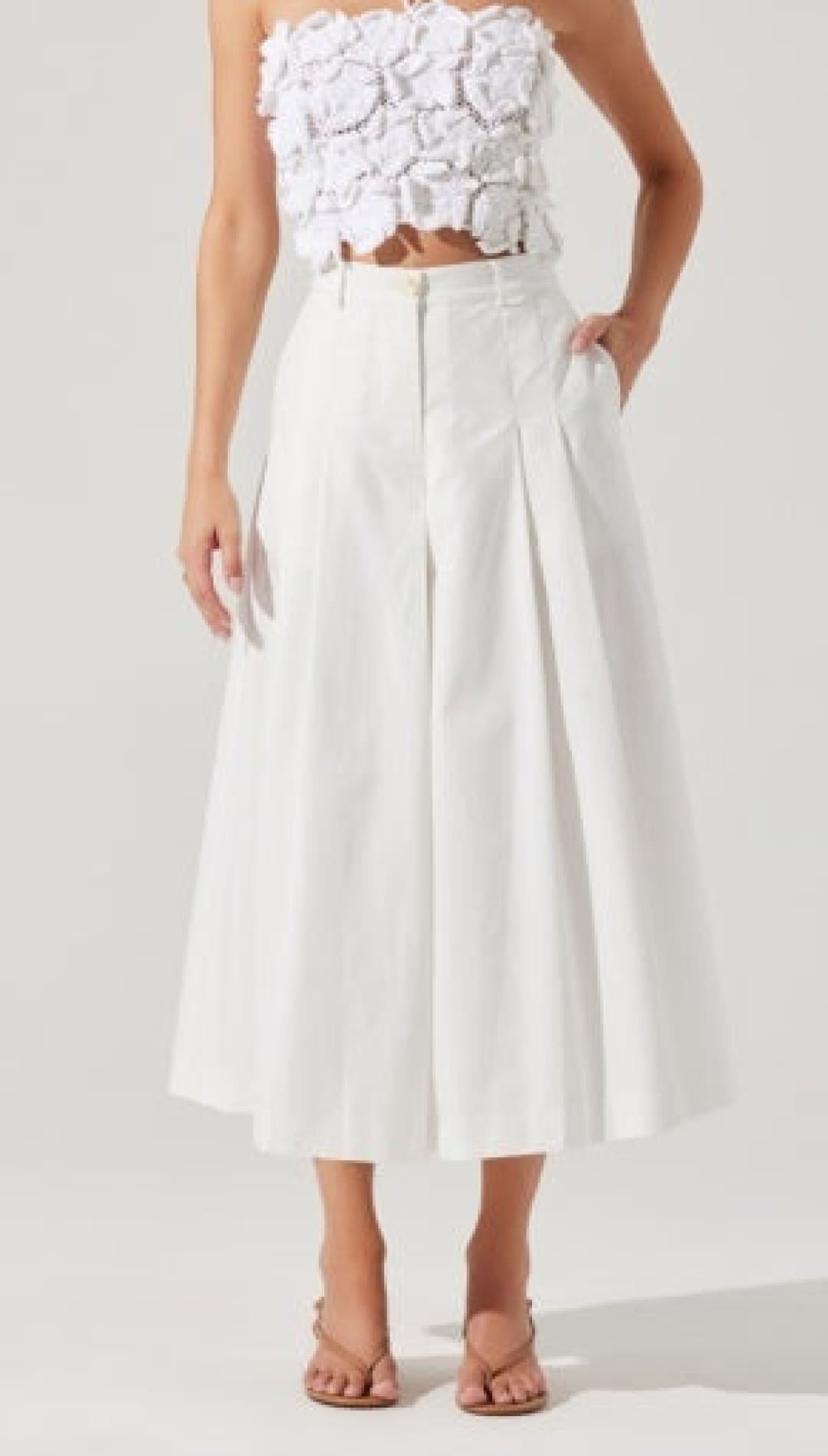 White pleated midi skirt.