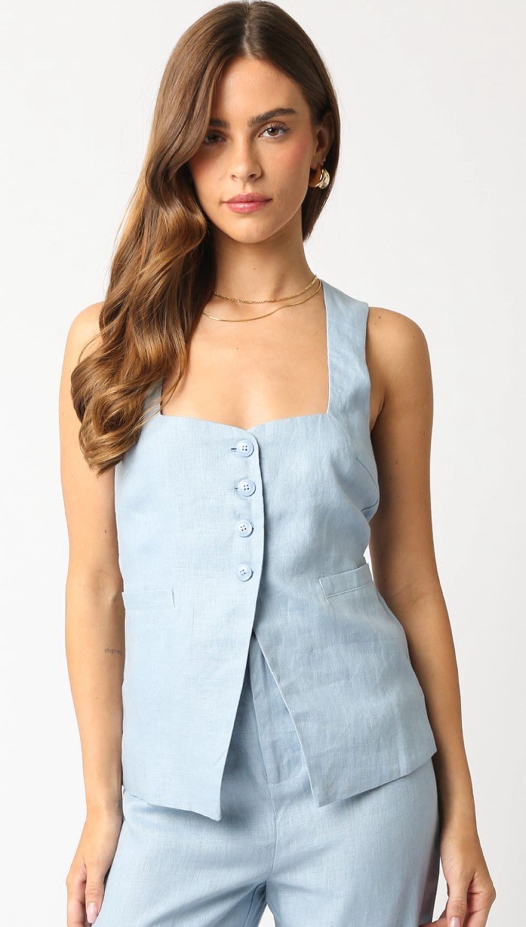 Light blue button-up tank top.