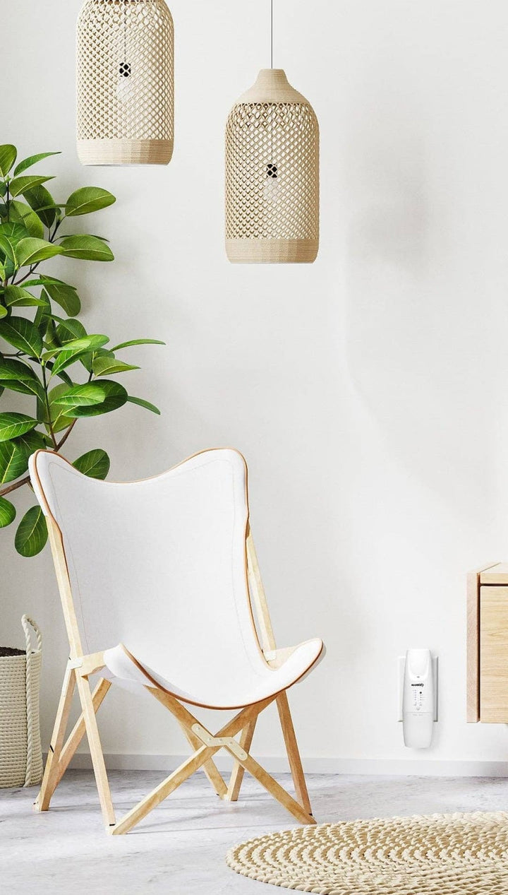 White canvas butterfly chair with wooden frame.