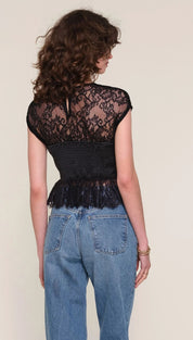 Black lace corset top with cap sleeves and floral pattern, likely from free people.