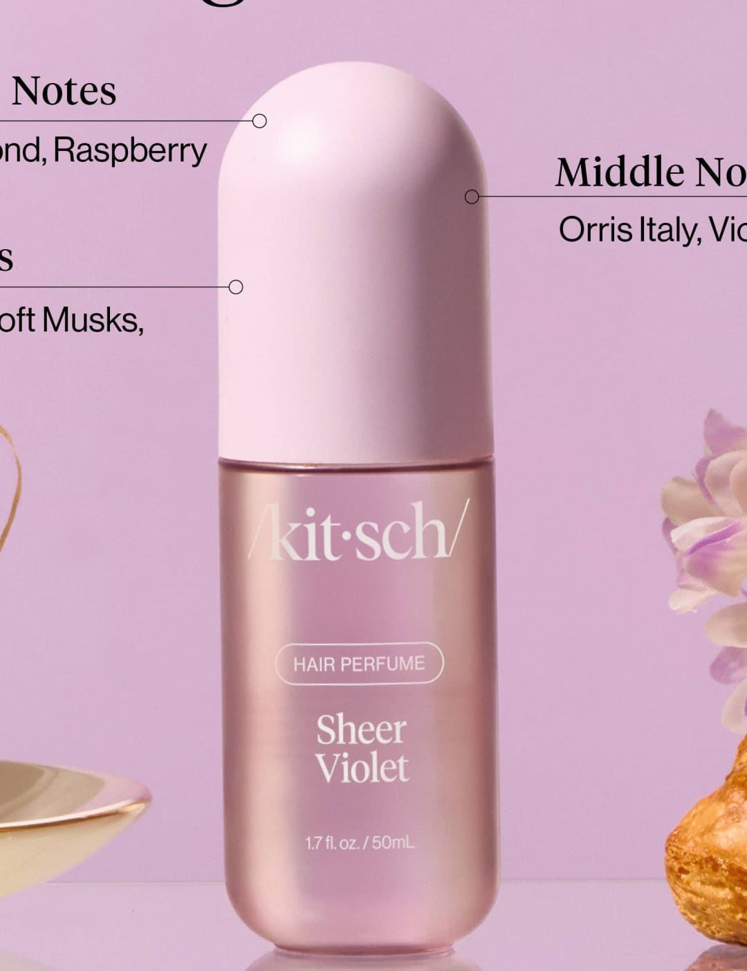 Lavender perfume bottle with white cap, floral design on label.