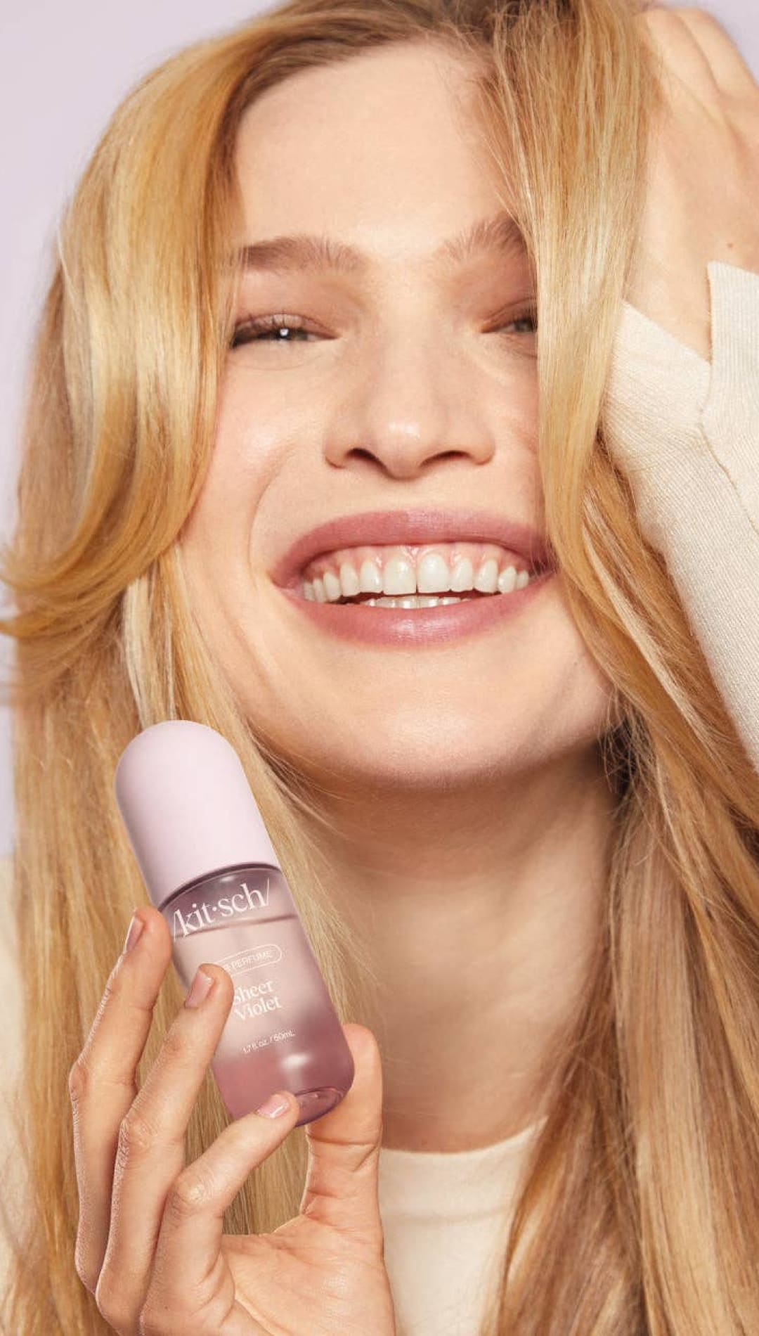 Lavender and white skincare bottle with a pump dispenser, designed by kiehl’s.